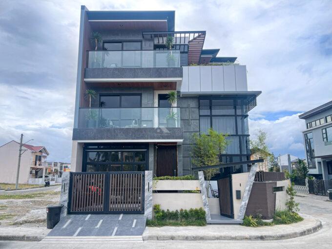 Impressive Modern Tropical Industrial Corner House For Sale in Grand Meadows, General Trias Cavite